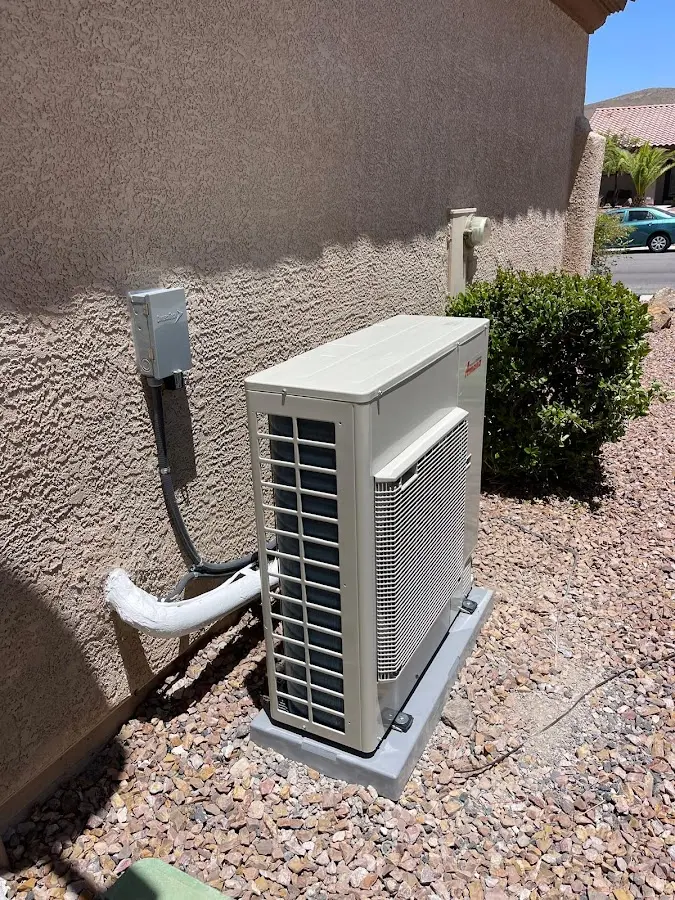 Residential air conditioning condenser unit in Kearns
